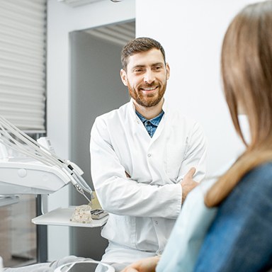 dentist talking to patient about dental implants in Thornville