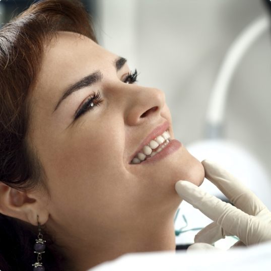 Woman smiling during dental visit