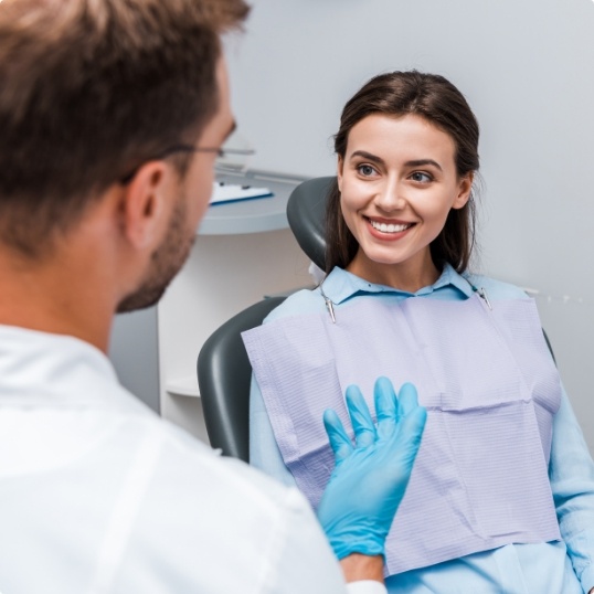 Woman smiling at dentist