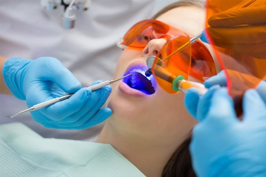 A patient getting a dental filling near Somerset