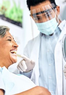 a patient receiving tooth replacements for missing teeth