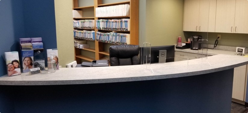 Reception desk in dental office waiting room