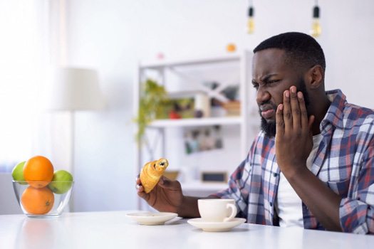 Man with tooth sensitivity